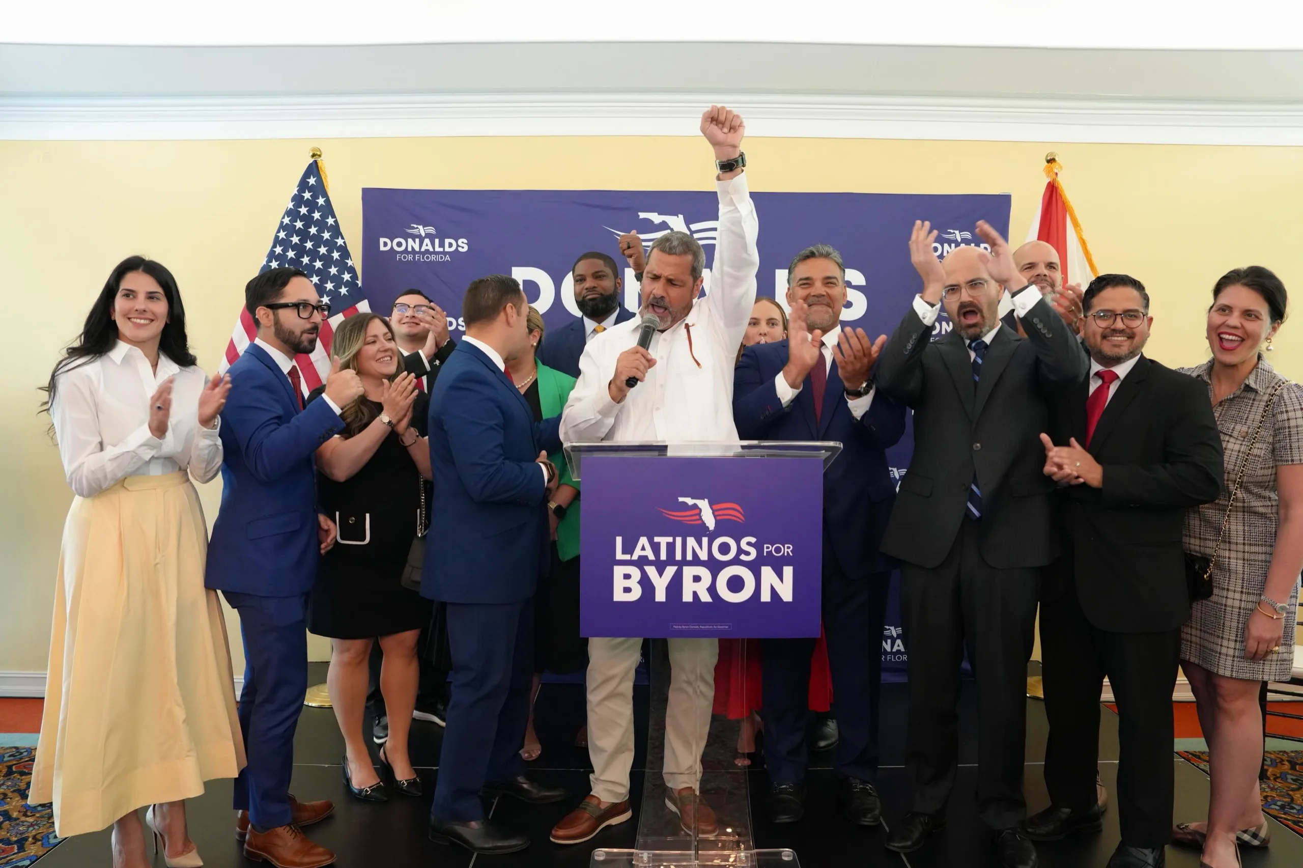Latinos for Byron rally with speaker at the podium